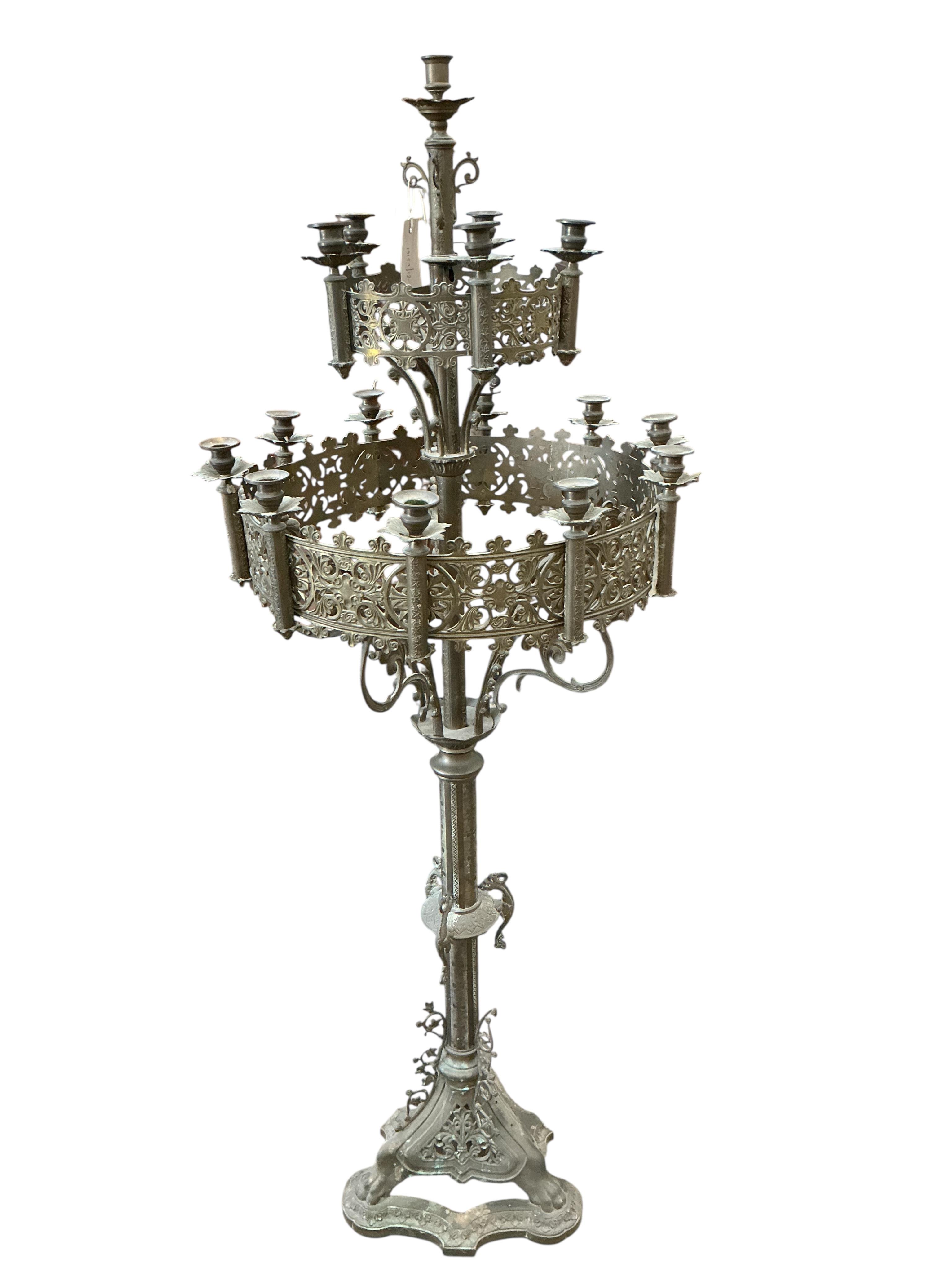A late 19th century French pierced brass ecclesiastical candlestand, height 152cm